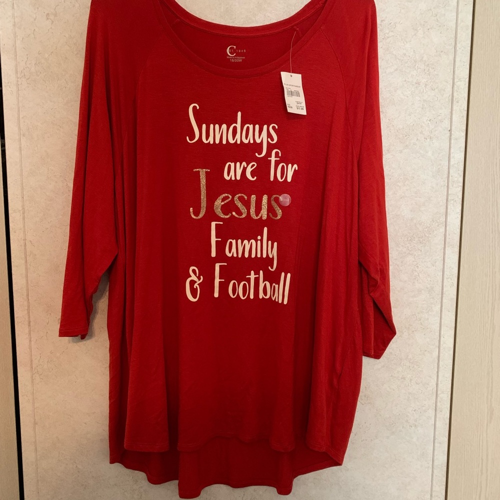 Red Curry in color; 3/4 in. sleeve top; 95% rayon; 5%spandex;